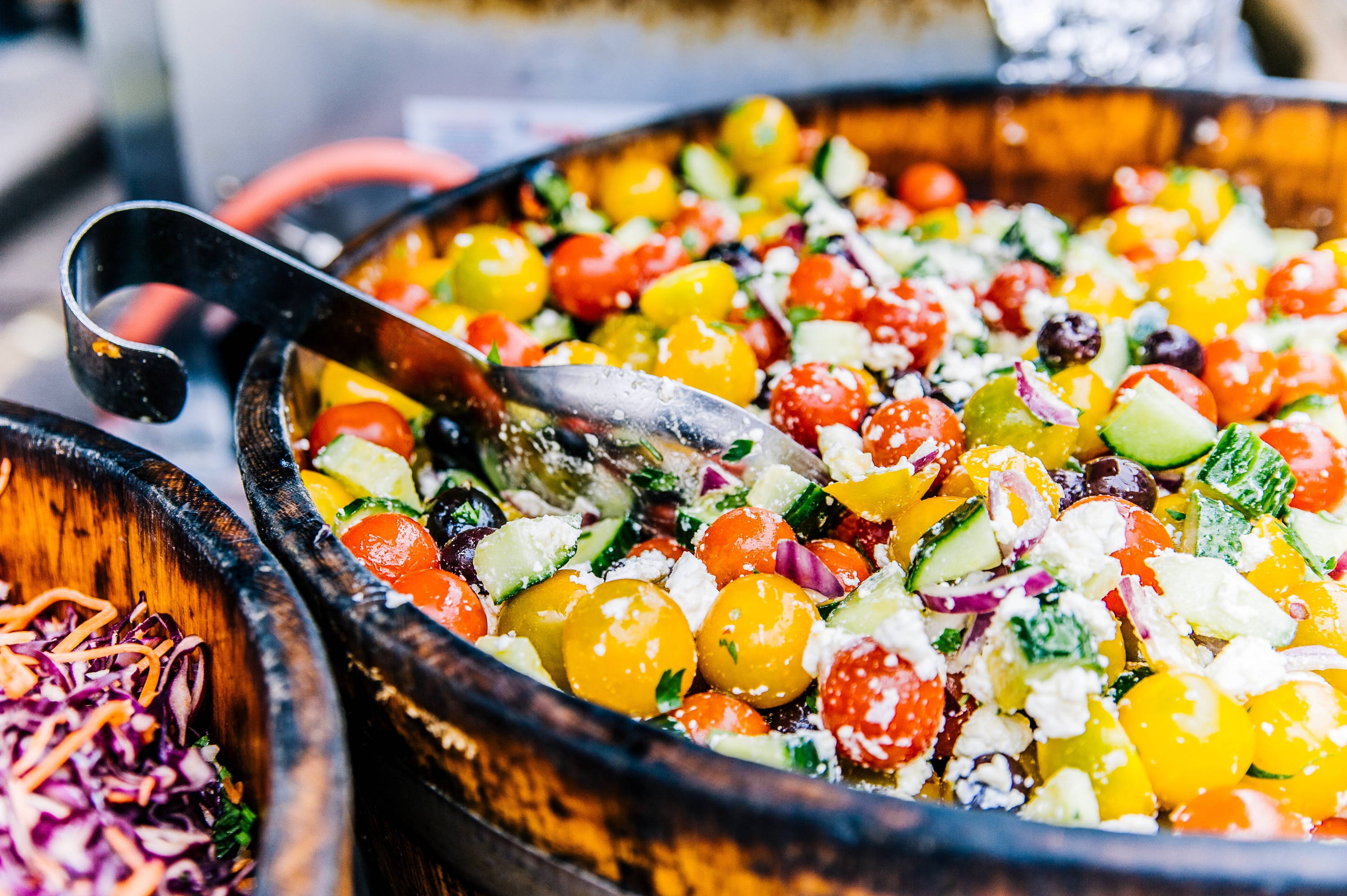 Traditional Greek salad mixed with olive, feta , yellow and red cherry tomatoes, cucumber and onion to pair with our Crisp Kiss of Wine Sauvignon Blanc.