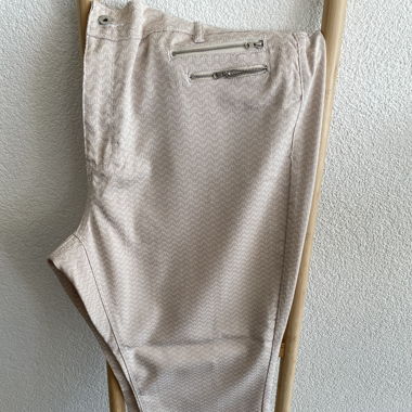 Pantalon à poches zippées avec joli motif
