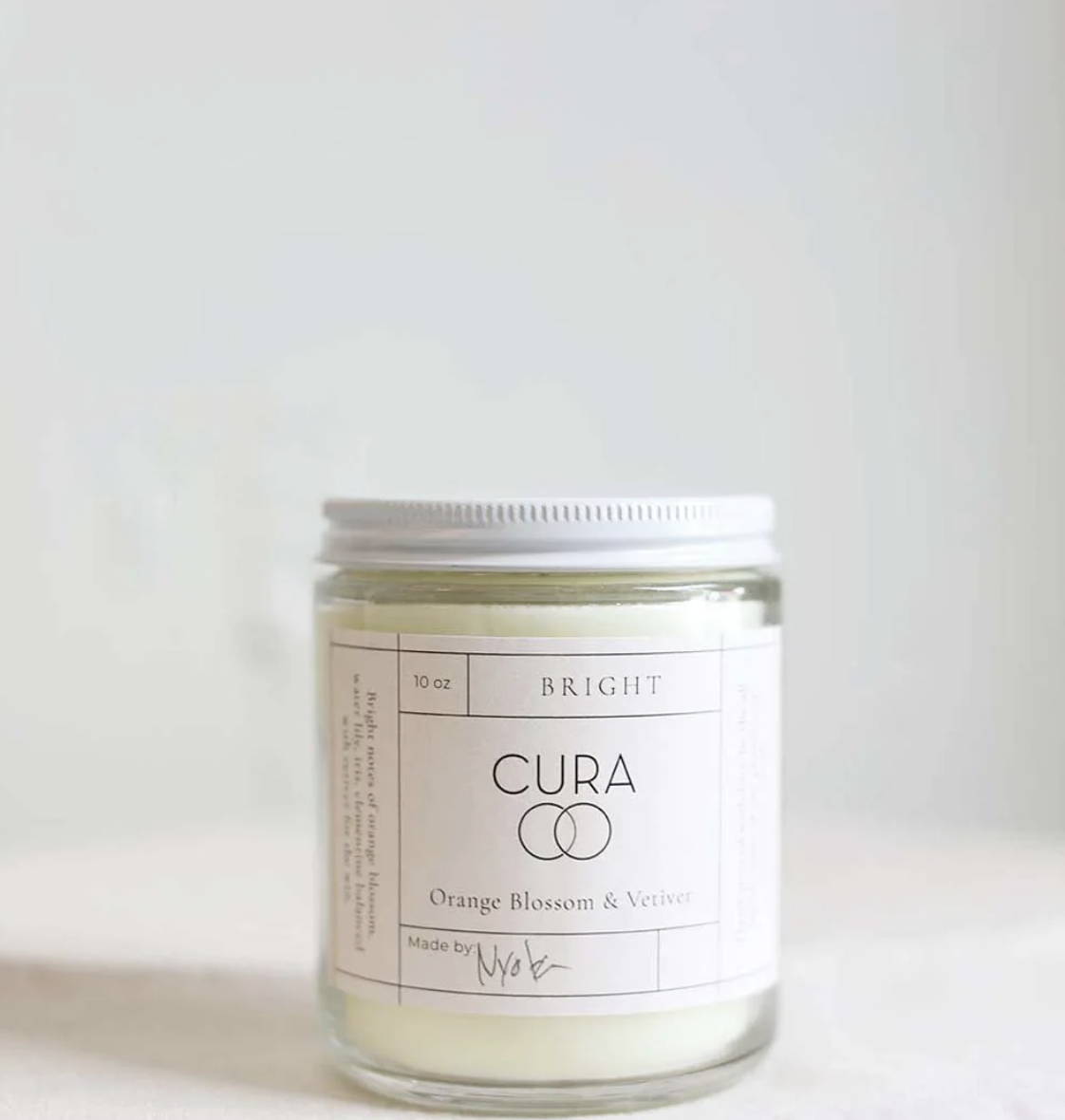 Cura Moon Notes. The Cura Co sustainable candle orange blossom & vetiver,  ethically made using fair trade practices to support refugees and women artisans 
