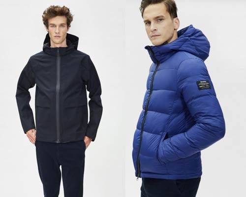 Man wearing dark navy waterproof recycled polyester coat from eco-brand Ecoalf and man wearing royal blue padded insulated sustainable jacket from Ecoalf