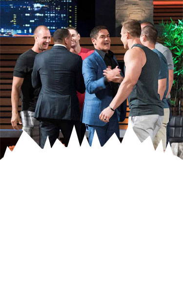 Ice Shaker CEO, Chris Gronkowski shaking hands with Mark Cuban on the set of Shark Tank