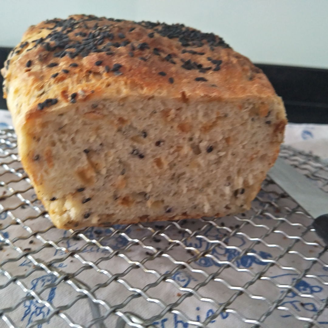 mixed seed and onion bread - crunchy crust, light and fluffy on the inside. just spread with butter when the bread is still warm