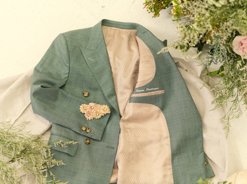 green suit jacket with floral embroidery