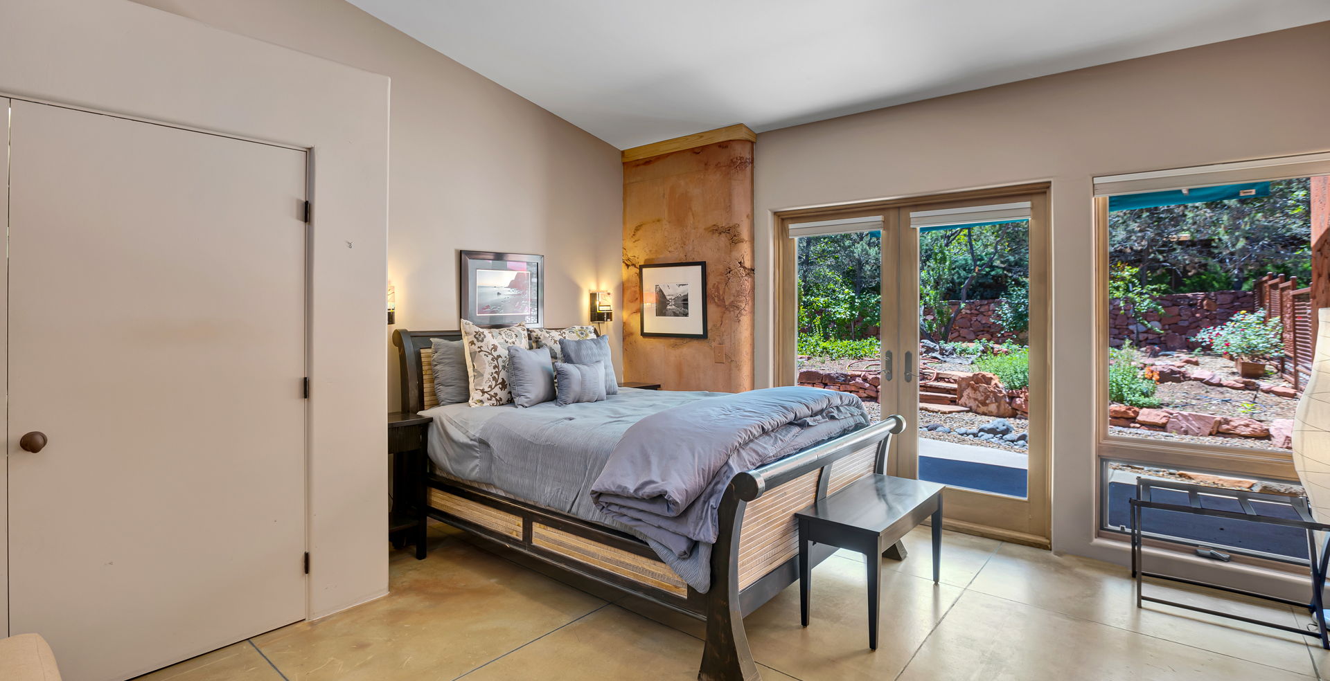 bedroom featuring tile floors and natural light