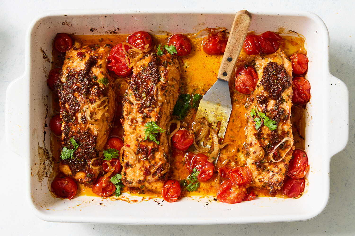 Baked Salmon With Harissa and Cherry Tomatoes