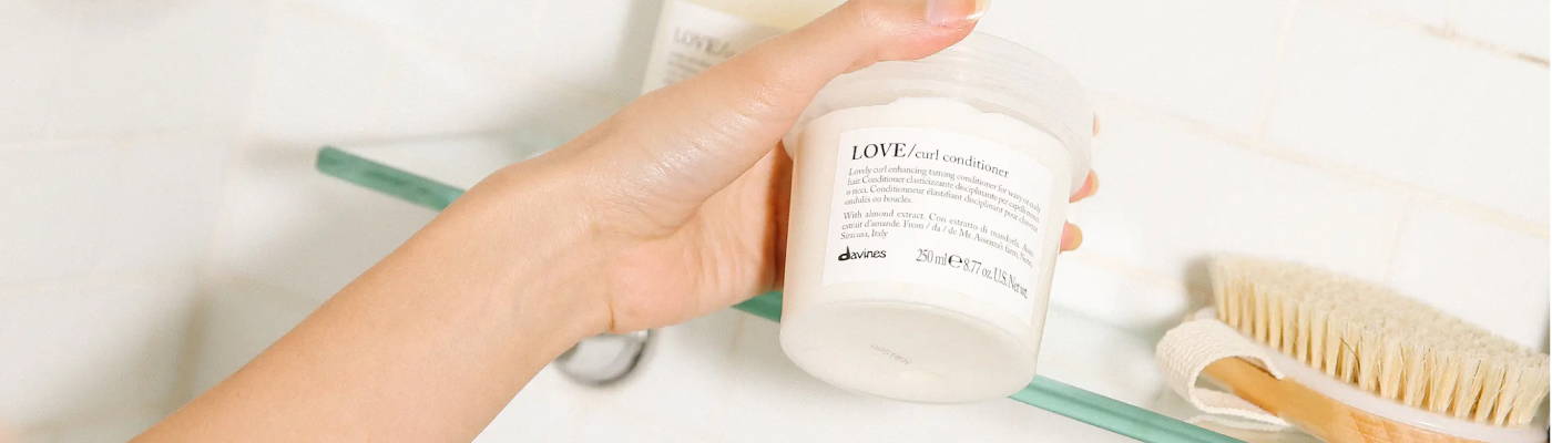 Davines model with platinum blonde hair in a french bob haircut