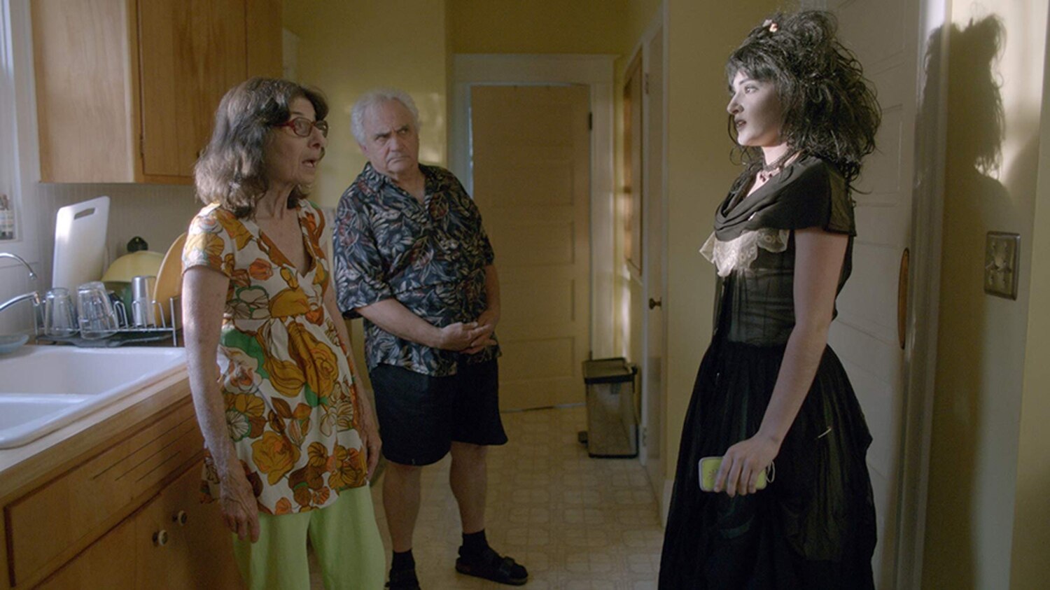 Joey and her parent's have a confrontation in their kitchen. Joey is wearing her goth outfit.