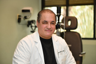 John Christoforidis, M.D.