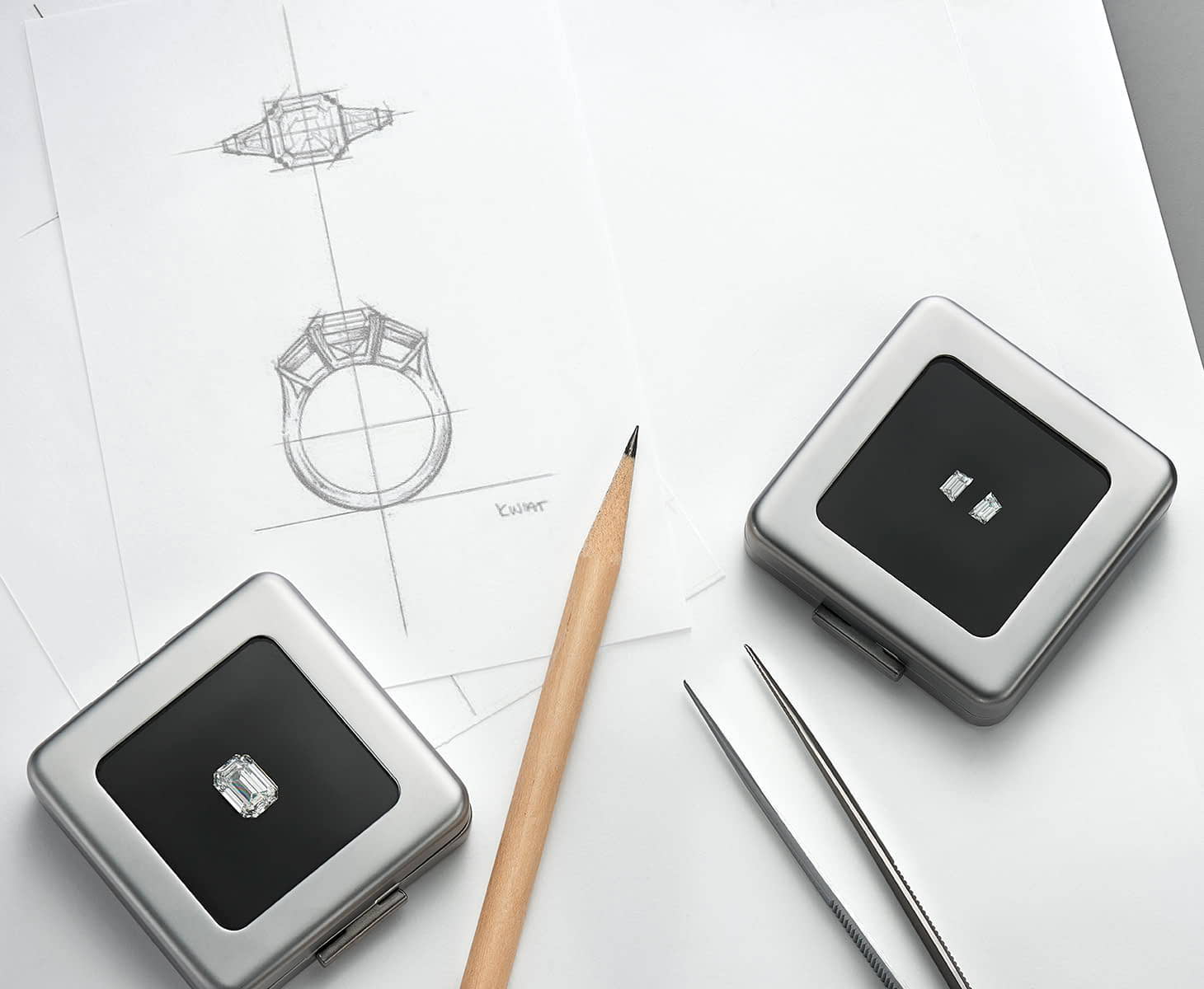 Diamond engagement ring being sketched out to be custom made.