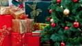 christmas presents under christmas tree holiday safety tips