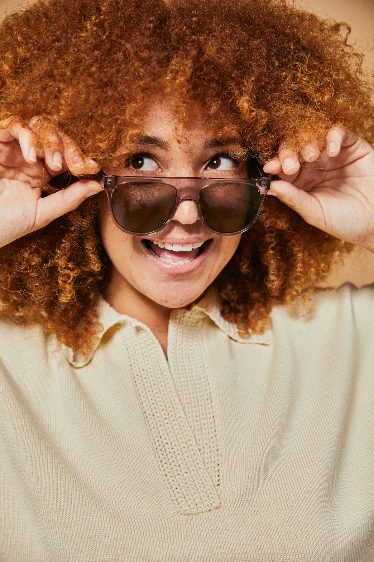 Female model wearing Ozeano polarised sunglasses
