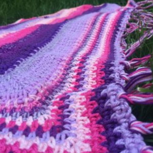 Shawl crocheted with 5 types of Yarn and Colors.