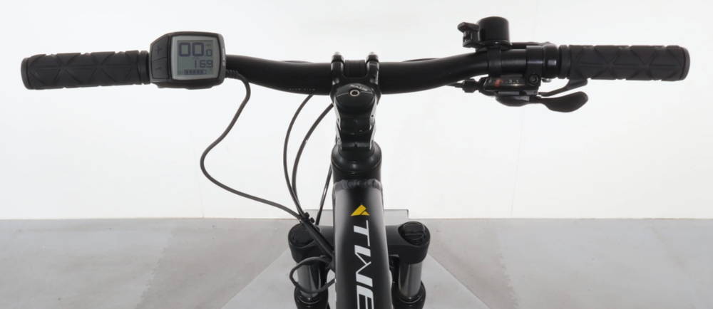 the handlebars and front stem on a Bulls Twenty4 E Zebra electric mountain bike