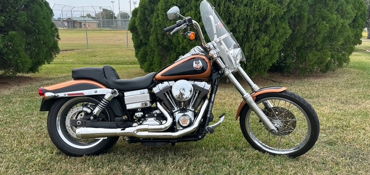 2008 HARLEY-DAVIDSON FXDWG DYNA WIDE GLIDE ANNIV. EDT. motorcycle for rent near La Porte, TX