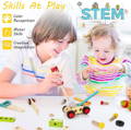 Brother and his little sister playing with a Montessori wooden toolbox toy and building a car on the table. 