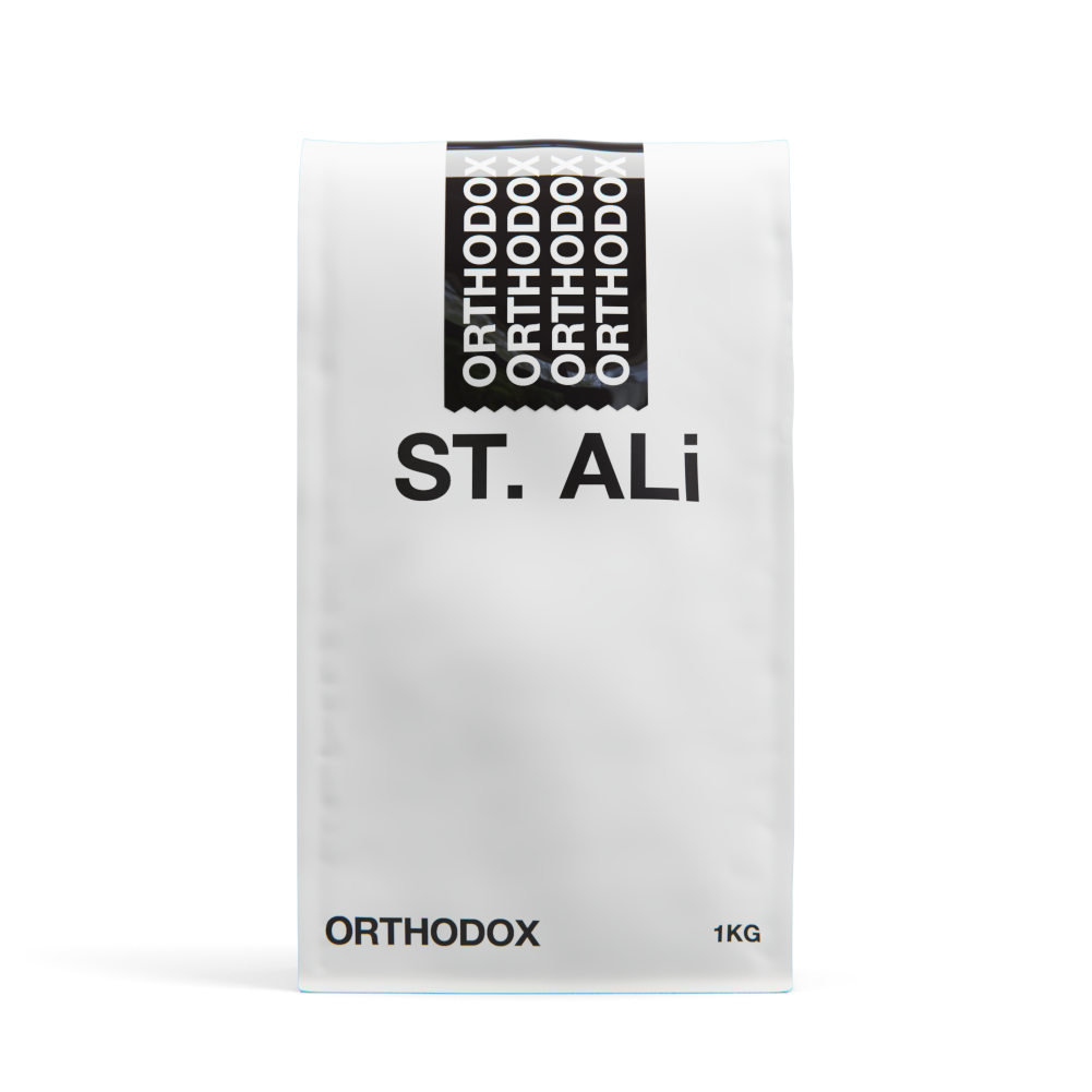 white 1 kilogram bag of orthodox coffee