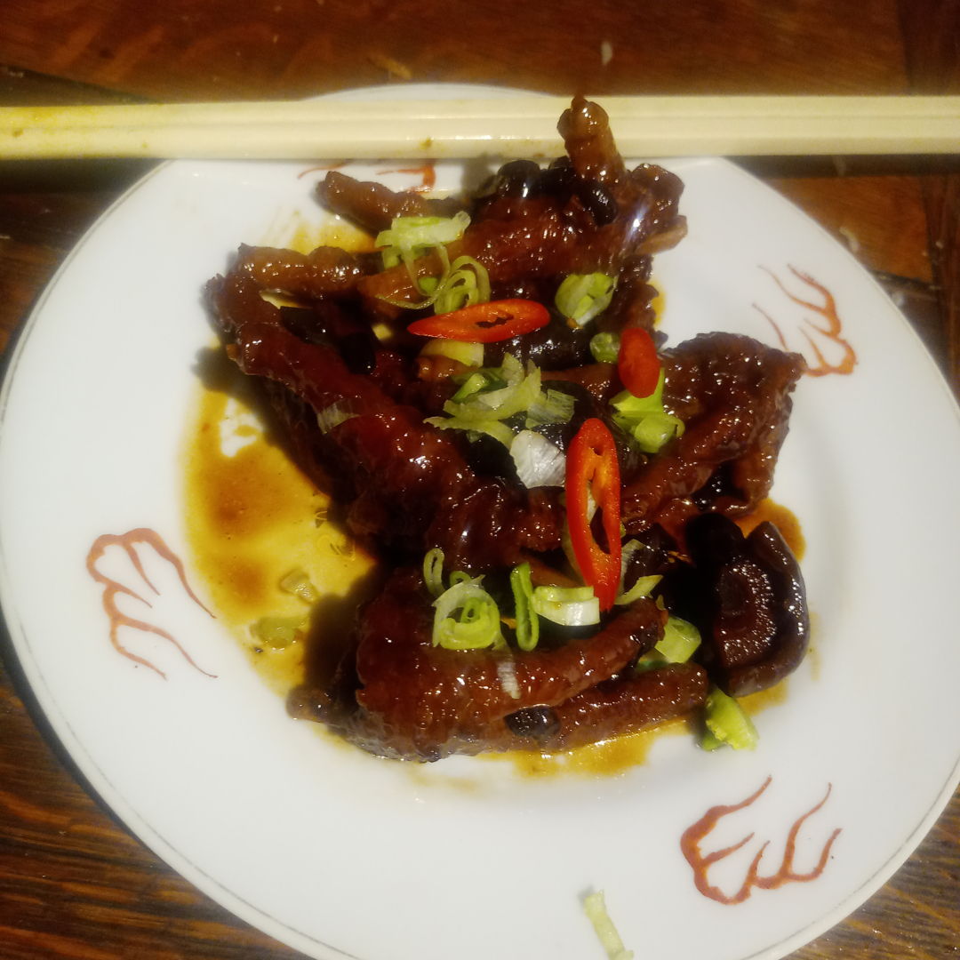 Braised dim sum chicken feet with mushrooms.. Oh the joy of sucking off the rich glutenous skin then spitting out the bones !!!