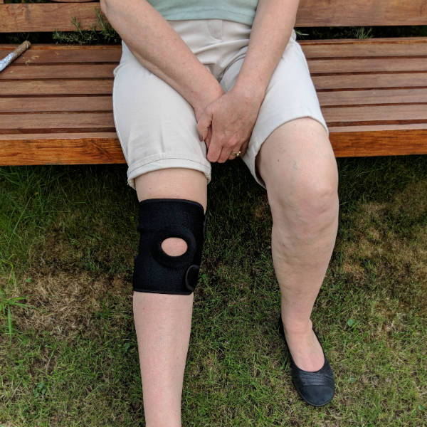 Man wearing knee support for arthritis