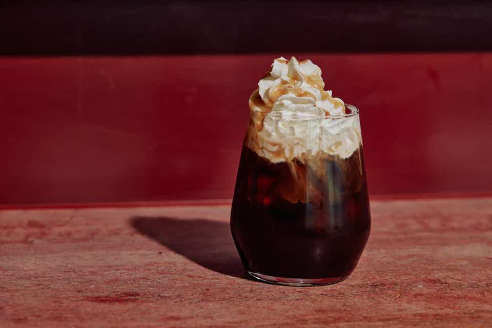 Exotic coffee mixed drink on a red table