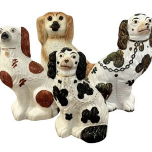 Collection of four antique quality hand painted Staffordshire dogs