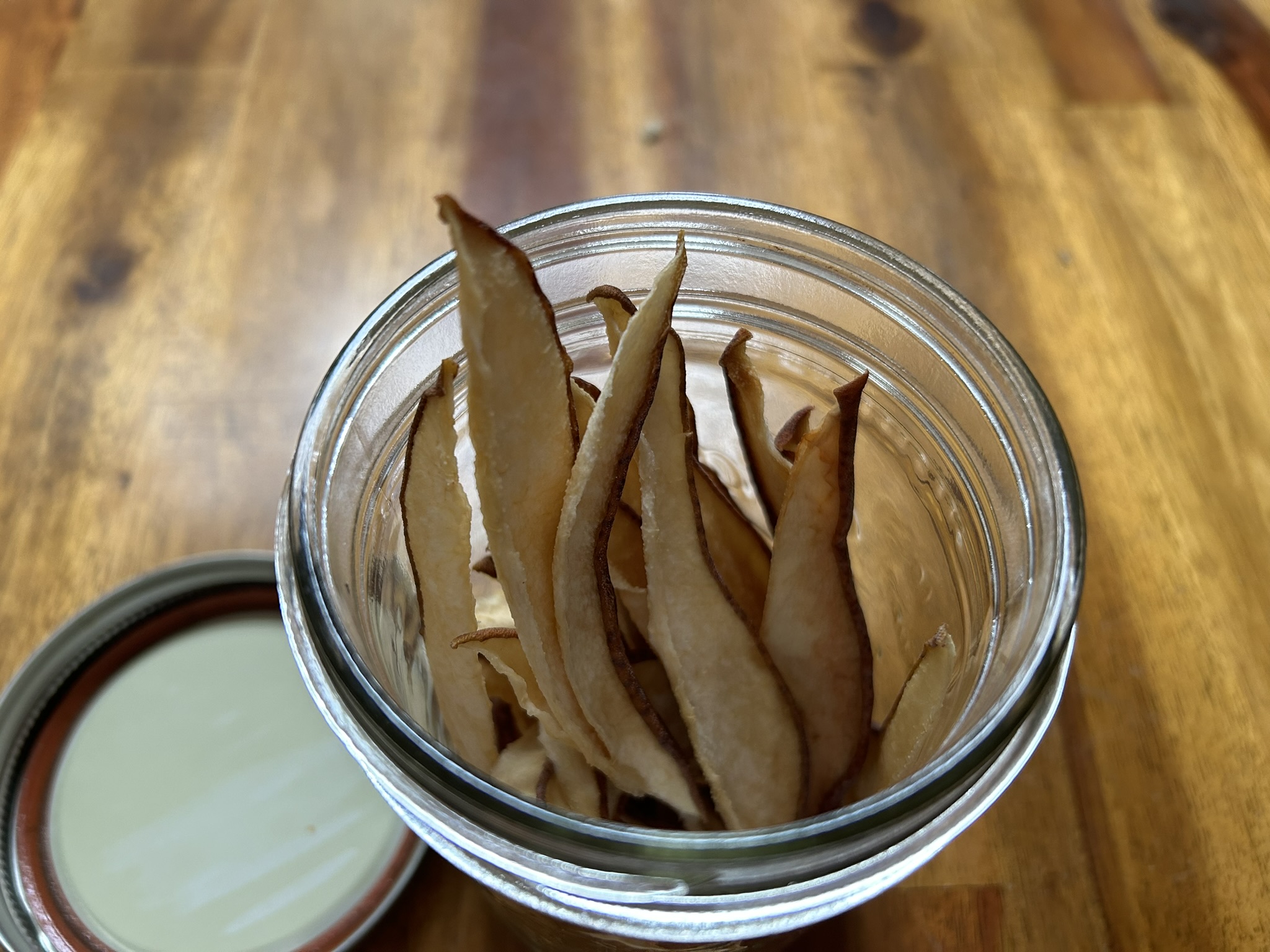 Dried pears in a mason jar for gifting