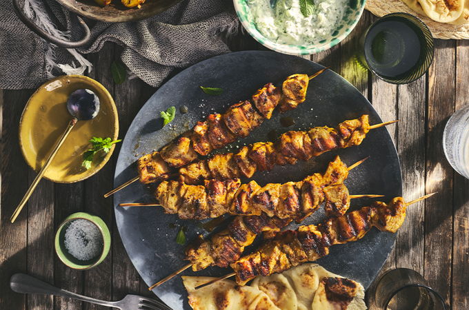 Indian-Spiced Chicken Skewers with Curry Potatoes and Raita Sauce