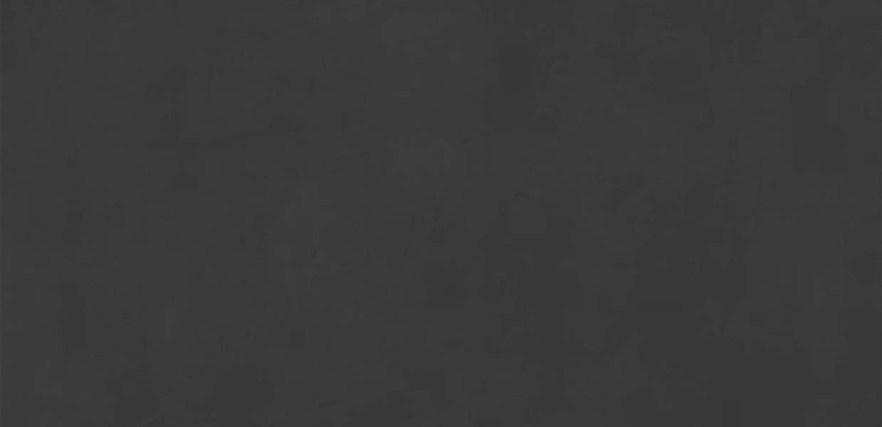 Dekton Eter: Materialmuster Dekton Eter, dunkelanthrazitfarbene Textur mit feinen Details.