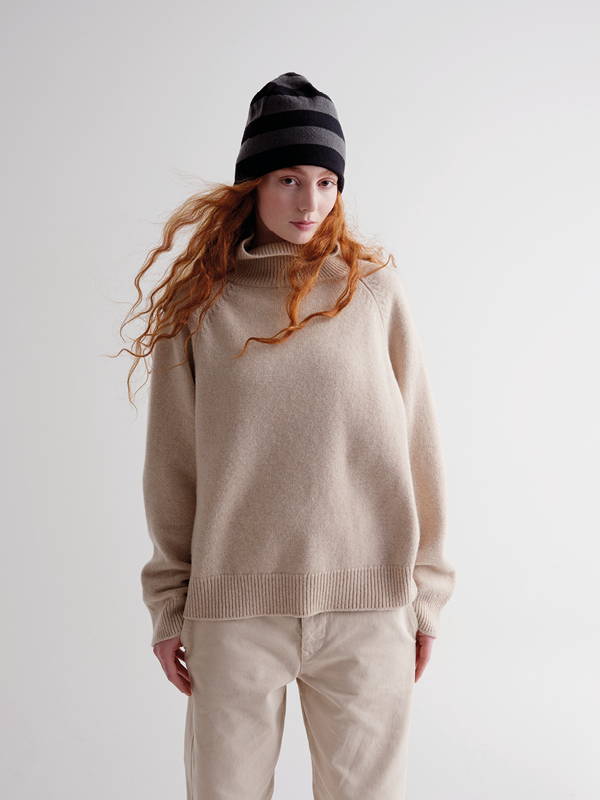 Model wears fine knit bold stripe hat black and drill grey