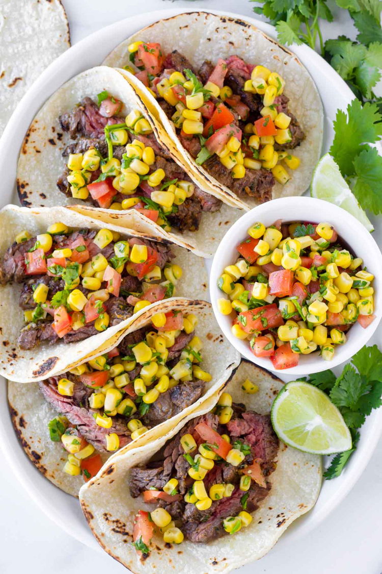 Photo of  Ancho Chili Flank Steak Tacos w/ Street Corn 