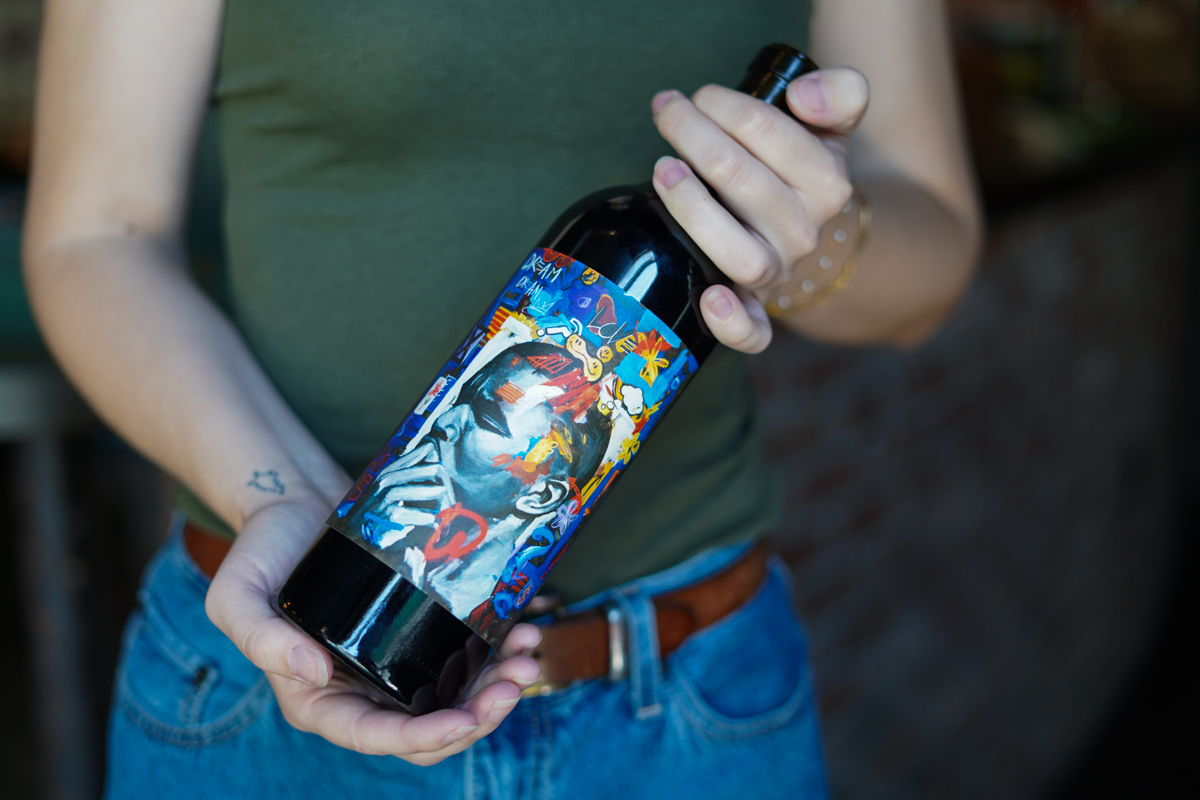 Artist Dwight White Dreams Up a Label For Latest Tank Garage Winery Collab With Blundstone