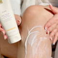 woman using European Wax Center slow body polish on legs