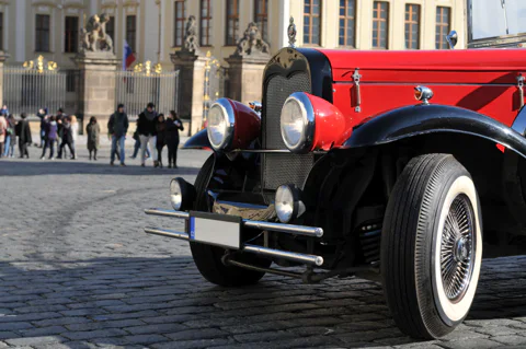 Fairytale Karlstejn Castle in Retro-Style Car