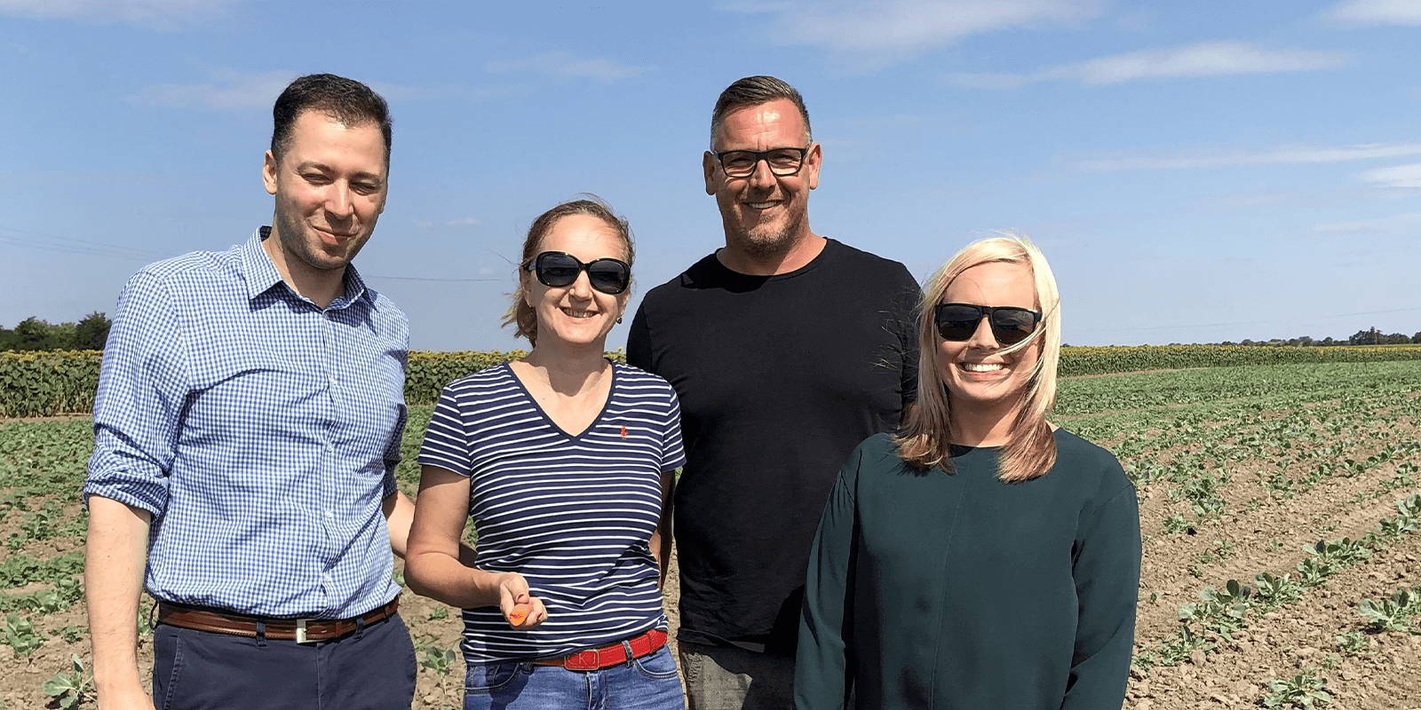 Meghan and team on farm