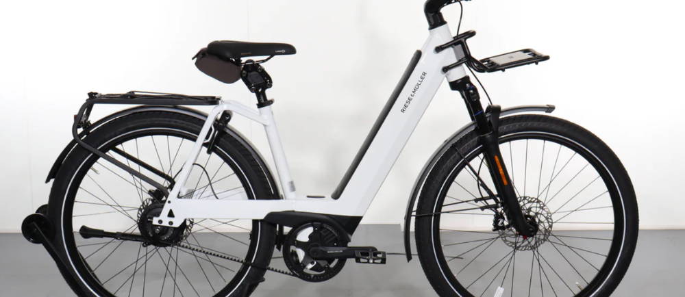 a white Riese & Müller Nevo4 GT Vario HS electric city bike