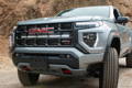 2023 2024 gray gmc canyon with one led light bar behind the grille