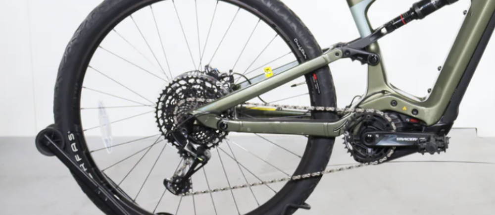 the rear wheel and drivetrain on a Cannondale Habit Neo full suspension electric mountain bike