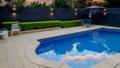 Pool lighting and outdoor wall lights creating a calm backyard setting in Rouse Hill by Havit