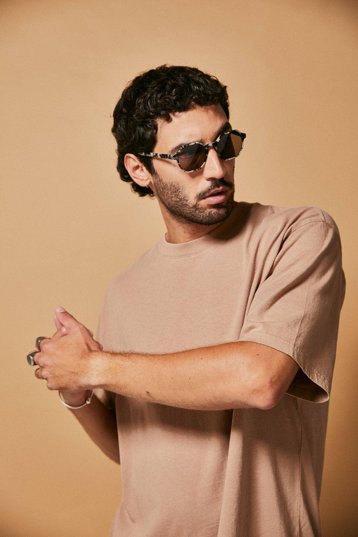 Male model wearing Ozeano polarised sunglasses