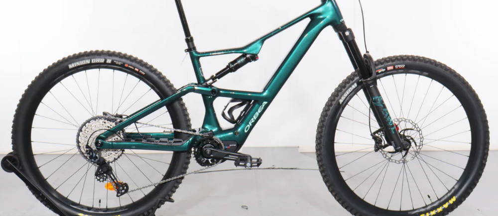 a green Orbea Rise H20 LT full suspension electric mountain bike