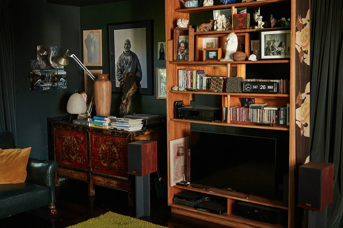 Interior of Fleur Palmer's home. There are lots of books and rich colors.