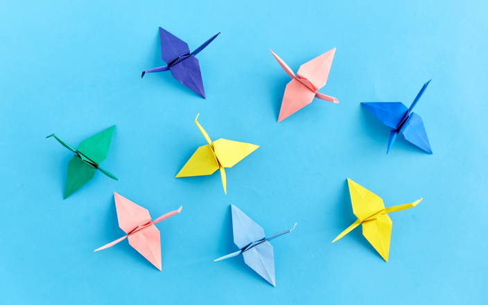 Paper cranes in various colors for Confetti's Virtual Origami Class with Kits
