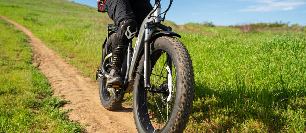 An e-MTB rider on an Aventon
