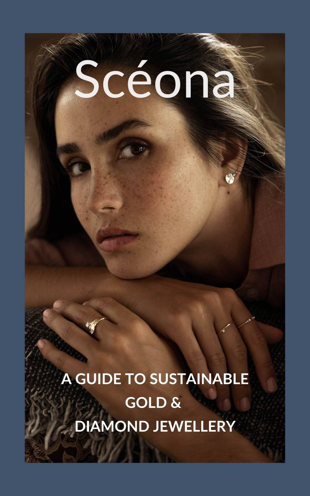 The cover of Sceona free ebook showing a woman wearing gold earrings and gold rings