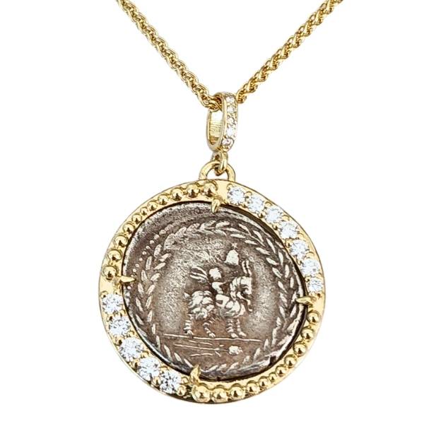 Ancient Roman Republic silver coin of winged genius riding a goat.  18kt gold and diamond pendant.