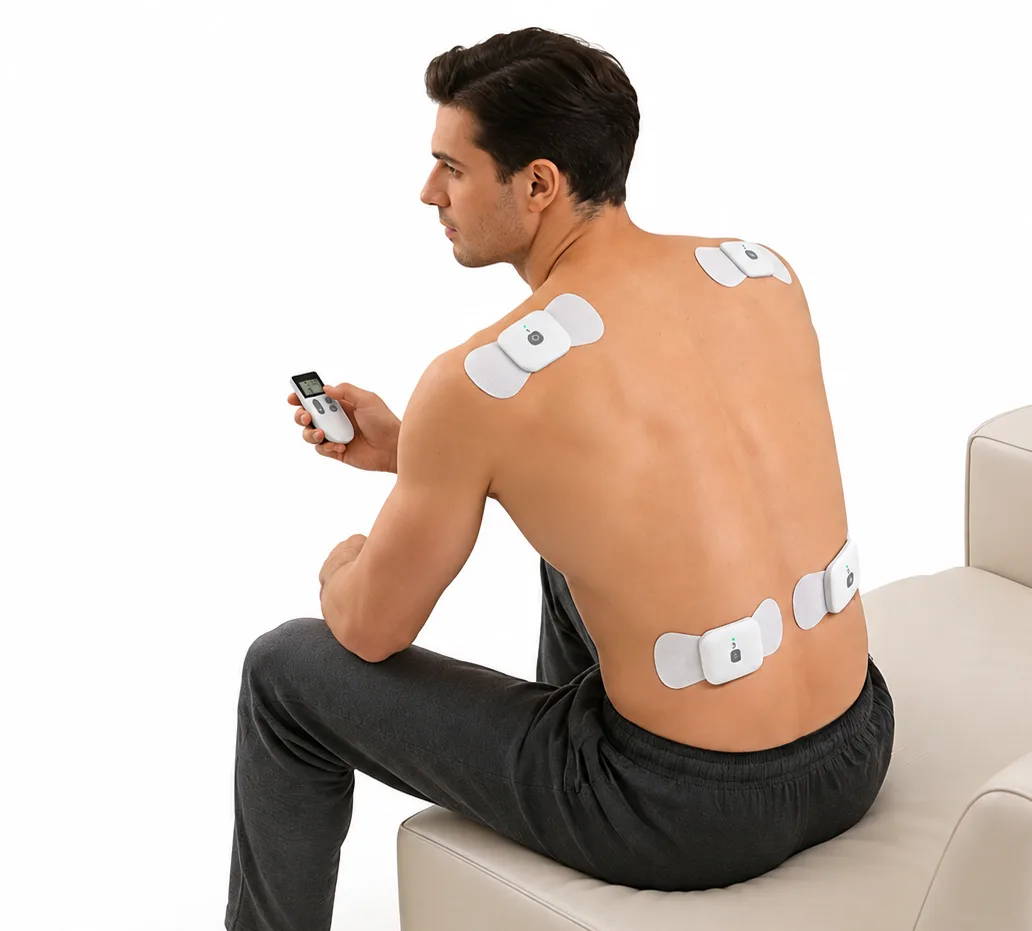 Man using Wellue Cable-Free TENS Therapy Device with wireless pods placed across the upper and lower back