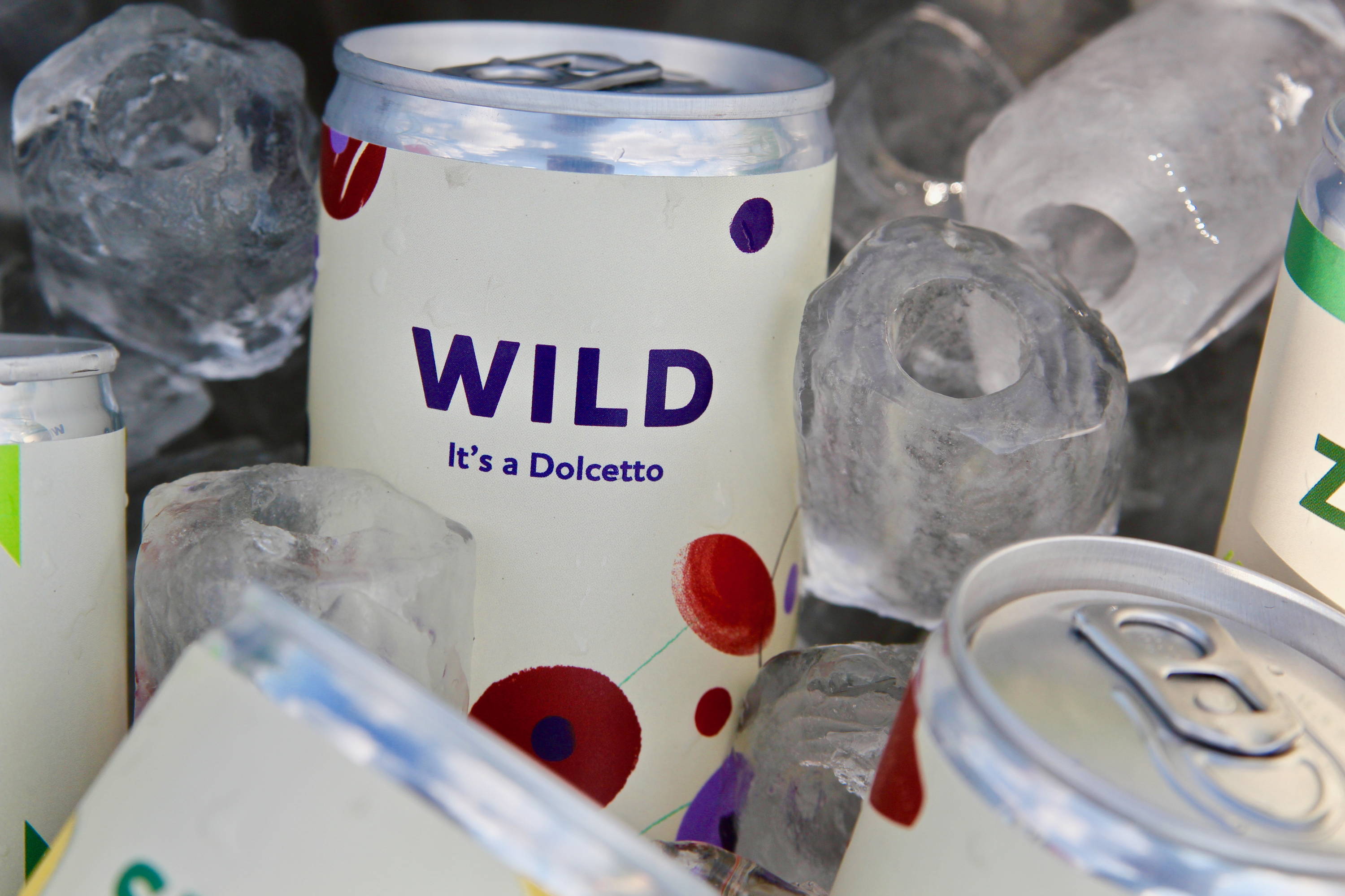 Close up of our Wild Dolcetto surrounded by ice blocks demonstrating the ideal serving temperature. 