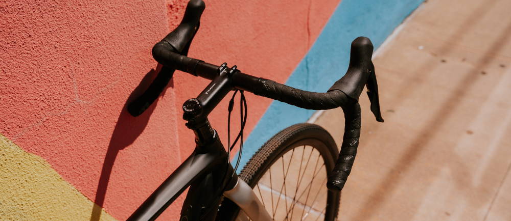the handelbars and front wheel on a Bianchi E-Impulso electric road bike
