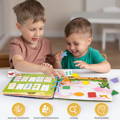 Two brothers sitting on a table and placing stickers onto the Montessori Busy Book. 