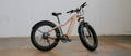Aventon Aventure electric bike in tan color
