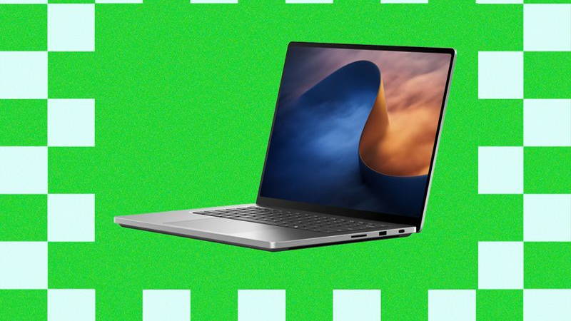 Side view of slim silver laptop with abstract art on the screen